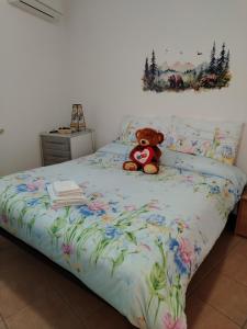 A bed or beds in a room at Casa dell'orso