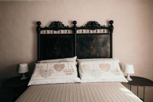 Ένα ή περισσότερα κρεβάτια σε δωμάτιο στο La Casa di Elso con piscina +26 φωτογραφίες