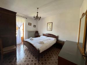 Giường trong phòng chung tại Vecchio Mulino's Flat-2 BedRooms Flat