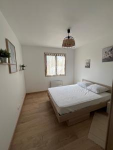 Ένα ή περισσότερα κρεβάτια σε δωμάτιο στο Jenny House