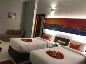 Postel nebo postele na pokoji v ubytování Gloria Aqua Park Hotel