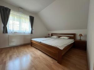 Postel nebo postele na pokoji v ubytování Apartment Šentjur center