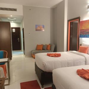 Postel nebo postele na pokoji v ubytování Gloria Aqua Park Hotel