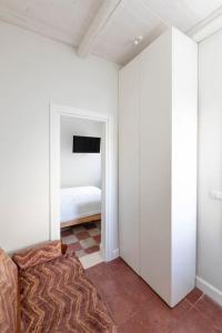 a room with a bedroom with a bed in it at Terrazza Nostromo Francesco in Trani