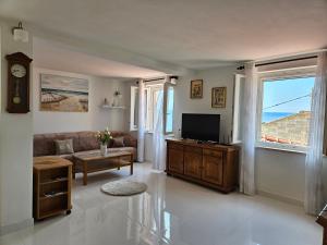 TV a/nebo společenská místnost v ubytování Oasis apartment