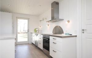 Kuchyň nebo kuchyňský kout v ubytování Holiday Home Frederikkesvej