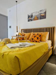 Postel nebo postele na pokoji v ubytování I colori della Sicilia