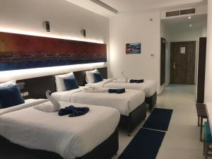 Postel nebo postele na pokoji v ubytování Gloria Aqua Park Hotel