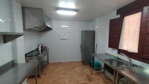 Η κουζίνα ή μικρή κουζίνα στο Casa Rural Villa Kora +11 φωτογραφίες