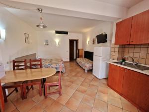 A kitchen or kitchenette at Al Barcoco