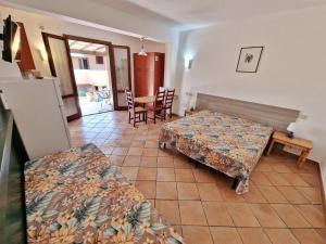 A bed or beds in a room at Al Barcoco