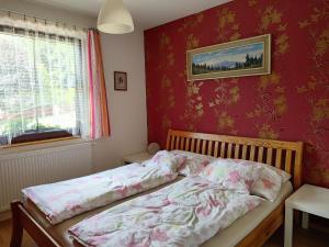 Postel nebo postele na pokoji v ubytování Apartmány Brevant