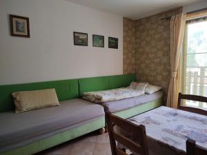 Postel nebo postele na pokoji v ubytování Apartmány Brevant