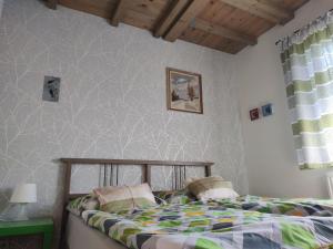 Postel nebo postele na pokoji v ubytování Apartmány Brevant