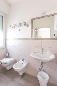Koupelna v ubytování Hotel Katina