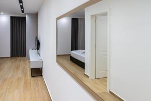 Katil atau katil-katil dalam bilik di Suite Hotel