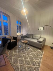 Posezení v ubytování Zeitapartments Am Fischmarkt