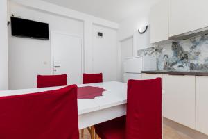 TV a/nebo společenská místnost v ubytování Sita Apartmani