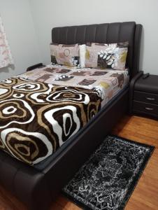 Ένα ή περισσότερα κρεβάτια σε δωμάτιο στο Moonlight Guest House