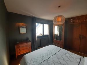 Ένα ή περισσότερα κρεβάτια σε δωμάτιο στο Bel appartement T2 atypique