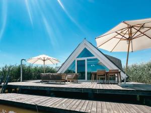 Fotografie z fotogalerie ubytování Seehütte Sonnenschilf - Premium Hide-Away Ferienhaus in Rust direkt am Neusiedlersee v destinaci Rust