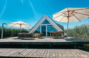 Fotografie z fotogalerie ubytování Seehütte Sonnenschilf - Premium Hide-Away Ferienhaus in Rust direkt am Neusiedlersee v destinaci Rust