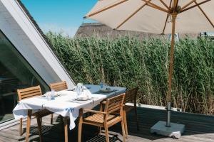 Zahrada ubytování Seehütte Sonnenschilf - Premium Hide-Away Ferienhaus in Rust direkt am Neusiedlersee
