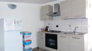 A kitchen or kitchenette at Casa Vacanza Miramare