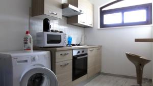 A kitchen or kitchenette at Casa Vacanza Miramare