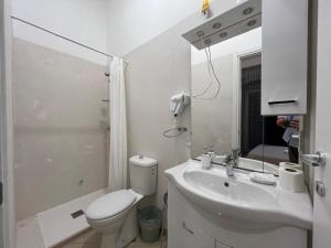 Koupelna v ubytování KiMia Home, Centro