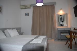Posteľ alebo postele v izbe v ubytovaní Lefteris Apartments in Ialysos Rhodes