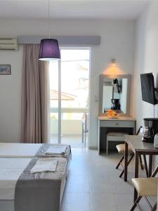 Posteľ alebo postele v izbe v ubytovaní Lefteris Apartments in Ialysos Rhodes