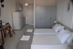 Posteľ alebo postele v izbe v ubytovaní Lefteris Apartments in Ialysos Rhodes