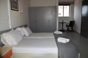Posteľ alebo postele v izbe v ubytovaní Lefteris Apartments in Ialysos Rhodes