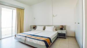 Posteľ alebo postele v izbe v ubytovaní Lefteris Apartments in Ialysos Rhodes