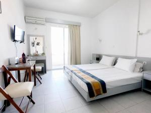 Posteľ alebo postele v izbe v ubytovaní Lefteris Apartments in Ialysos Rhodes