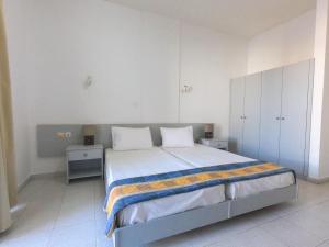 Posteľ alebo postele v izbe v ubytovaní Lefteris Apartments in Ialysos Rhodes