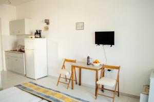 Kuchyňa alebo kuchynka v ubytovaní Lefteris Apartments in Ialysos Rhodes