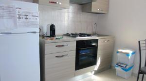 A kitchen or kitchenette at Casa Vacanza Miramare