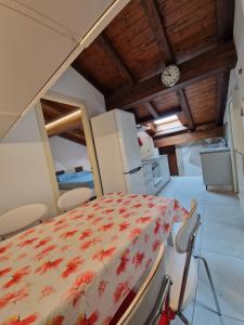 Postel nebo postele na pokoji v ubytování Maisons de Aoste