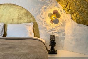 Ліжко або ліжка в номері Onar Suites & Villas