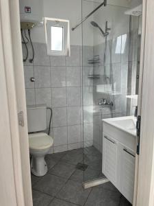 Koupelna v ubytování Beni Bungalows + 37 fotografií