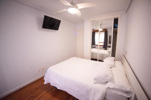 Postel nebo postele na pokoji v ubytování Apartacentro