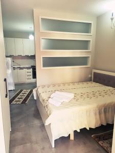 Postel nebo postele na pokoji v ubytování Beach Gem