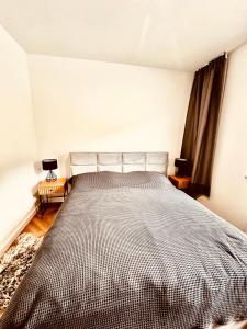 Postel nebo postele na pokoji v ubytování Deer Apartment