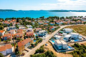 an aerial view of a town next to the water at Holiday home Val in Šibenik