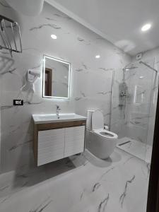 Koupelna v ubytování Hotel Aleks