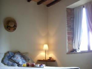 A bed or beds in a room at Agriturismo Le Vigne di Pace