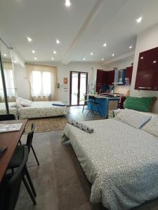 Ένα ή περισσότερα κρεβάτια σε δωμάτιο στο Casa Mia