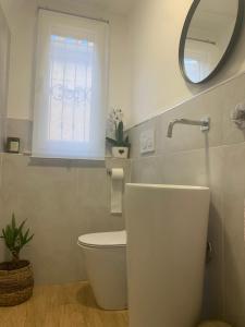 Koupelna v ubytování La Maison di Sara + 6 fotografií